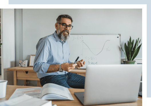 A teacher doing a online class in front of the camera.