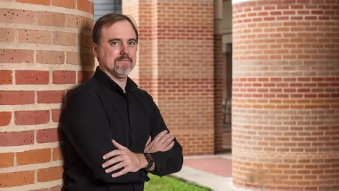 Todd Treangen standing outside on the Rice University campus